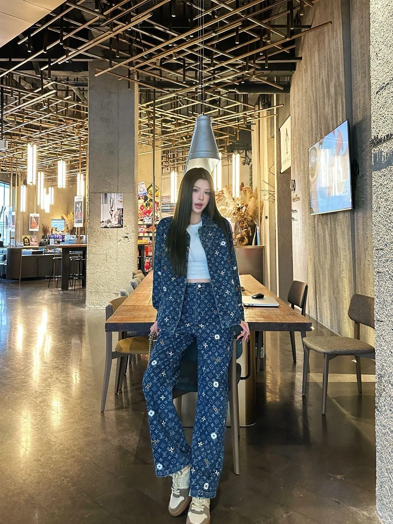 Louis Vuitton/Louis Vuitton all-over logo daisy embroidered jeans